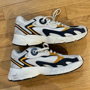 Adidas White and Dark Blue Sneakers with Gold Highlights